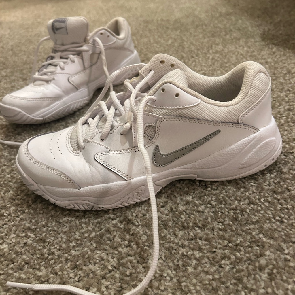 Nike White Athletic Shoes With Gray Logo